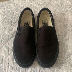 All black slip on Vans